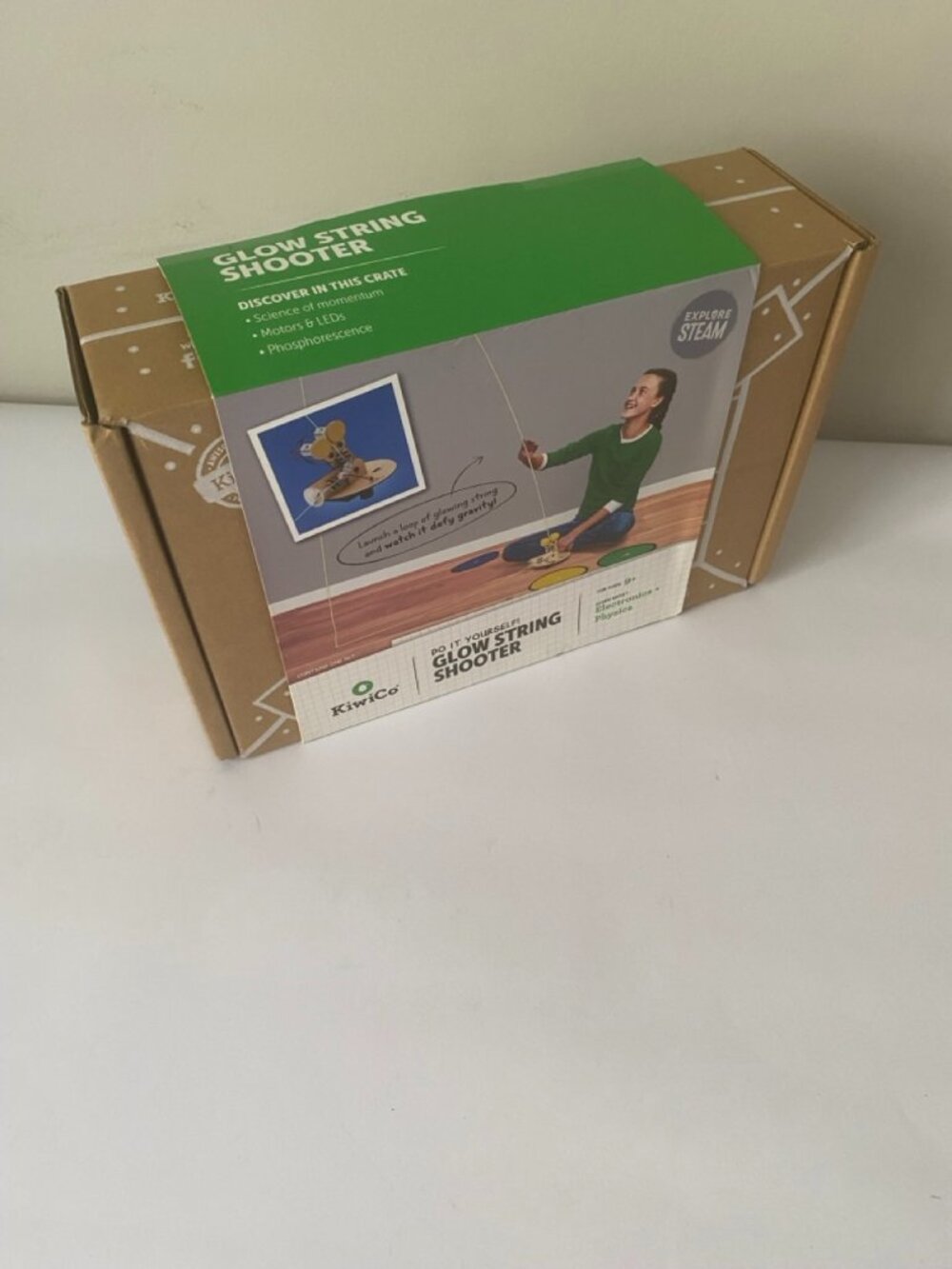 KiwiCo Glow String Shooter build kit. Recommended ages 9+.